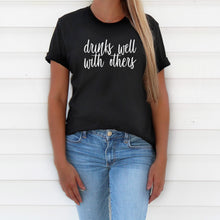 Load image into Gallery viewer, Drinks Well With Others T-Shirt (Black)