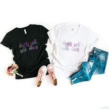 Load image into Gallery viewer, Drinks Well With Others V-Neck T-Shirt